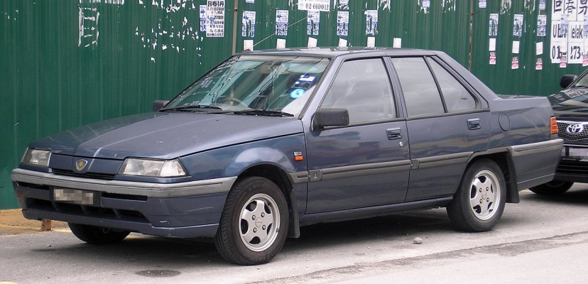 1280px-Proton_Saga_Iswara_(saloon)_(front),_Serdang.jpg