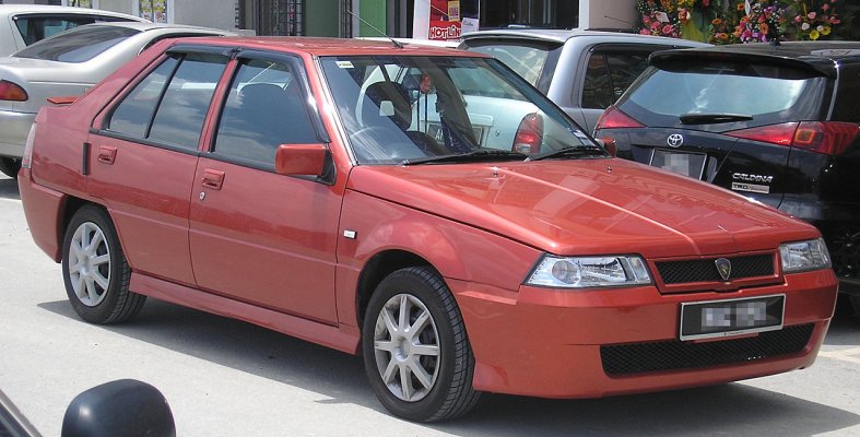 1280px-Proton_Saga_(re-release;_third_facelift)_(front),_Serdang.jpg