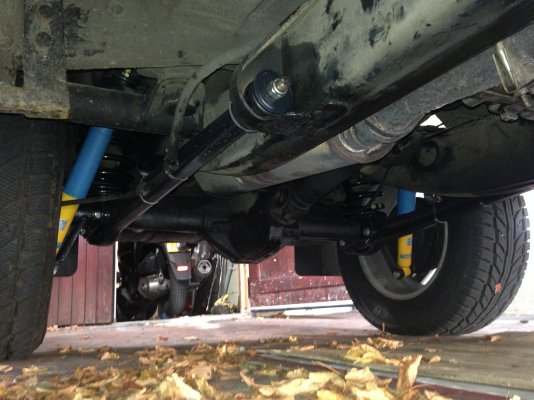 trailing arms rear underneath car.jpeg