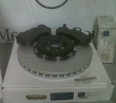 FRONT OEM DISCS AND PADS.jpg