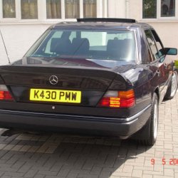 Genuine AMG ducktail spoiler fitted.