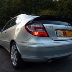 SLK arch spoiler, AMG style boot lip, after market parking sensors.