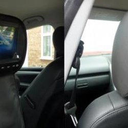 Xtron 9" DVD Headrest. Right side picture with zipped cover closed.