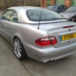 New exhaust (larger exit pipes) decat and Brabus decals. Brabus body kit, boot spoiler and clear tail lights .