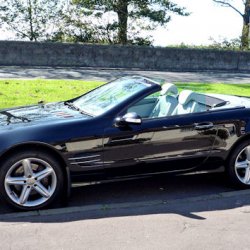 Shiny side view, nothing better than a gleaming metalic black.