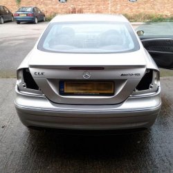 Pre-facelift rear lights removed, chassis modified to fit the facelift lights then painted with Hammerite to prevent any future rust.