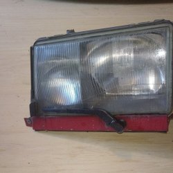 Passenger side (RHD) front headlight