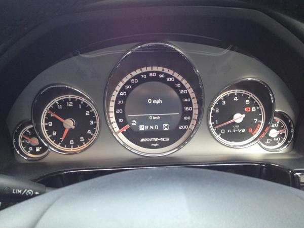 200mph Speedo. 
There's an AMG display mode in the centre of the speedo showing numeric mph, water temp and oil temp. The oil temp flashes until the