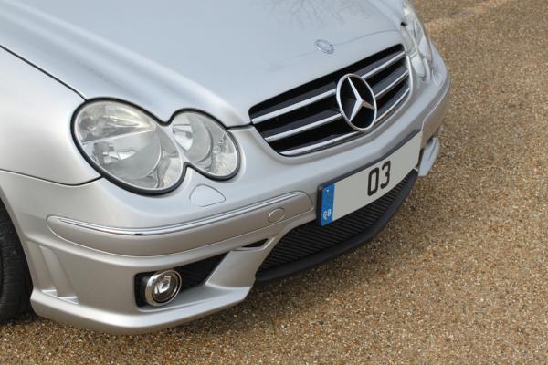 CLK63 AMG Front bumper with Carbon Wrap central cut out