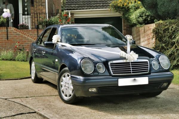 E280 in its Wedding Dress for my niece. Brilliant car, quite thirsty due to how I drove it, sold on to some Nigerians for cash in a layby on the A14 (