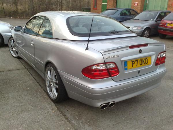New exhaust (larger exit pipes) decat and Brabus decals. Brabus body kit, boot spoiler and clear tail lights .